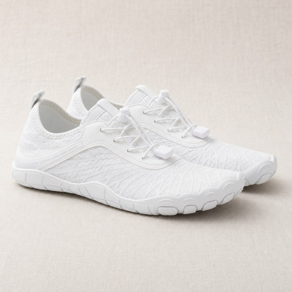 White barefoot shoes, pair, three-quarter view
