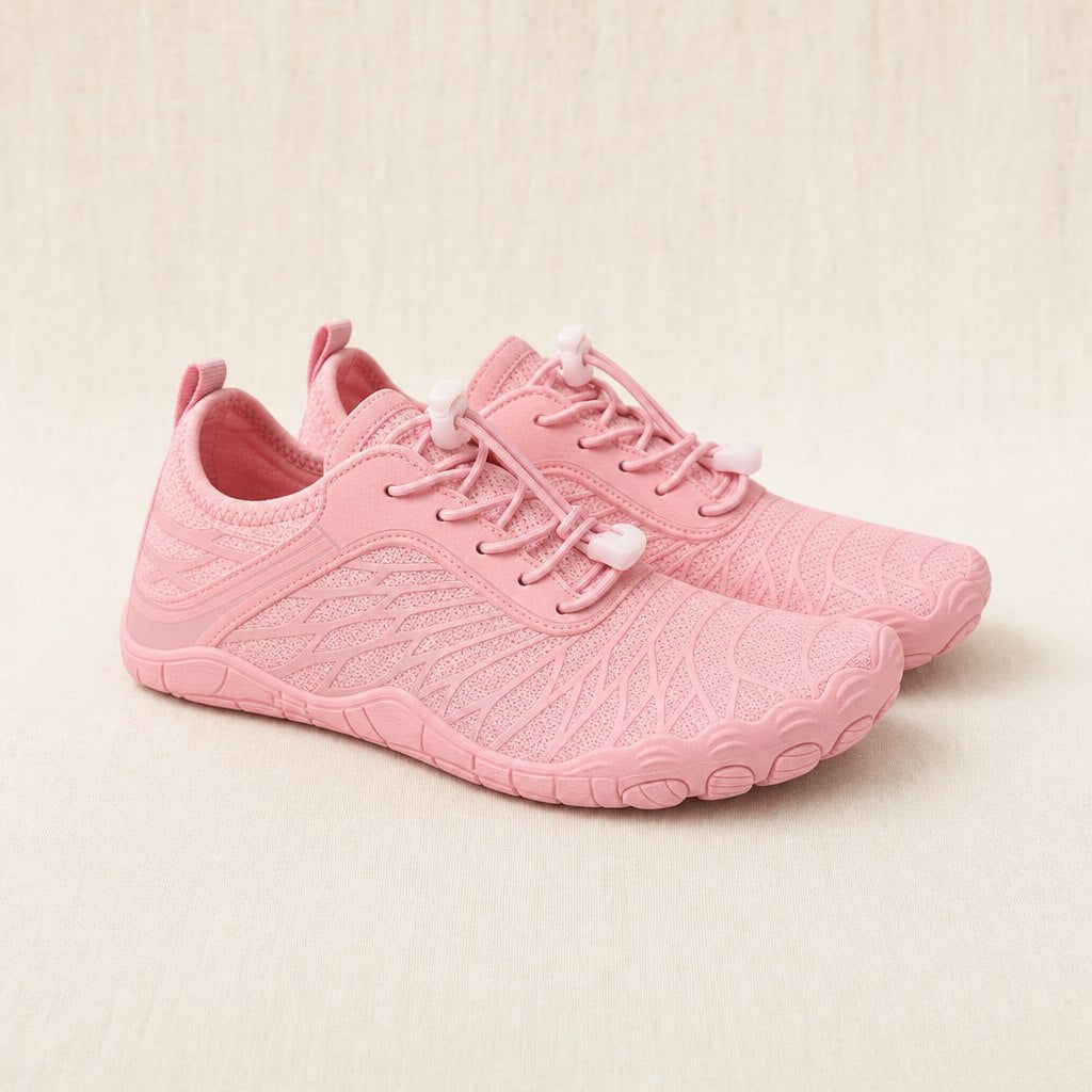 Pink barefoot shoes, pair, three-quarter view