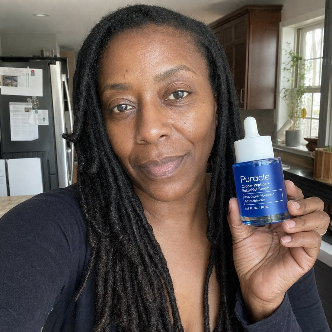 A customer holding the bottle