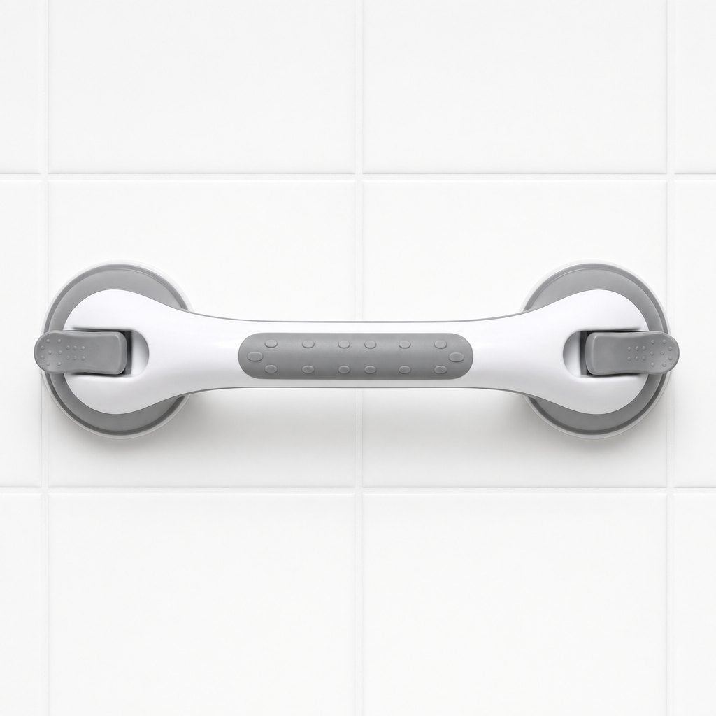 Suction grab bar mounted on smooth tile beside a bath