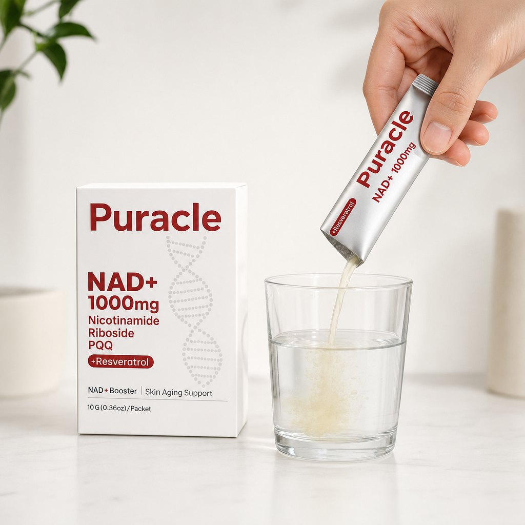 Pale liquid pouring from a torn sachet into a glass of water